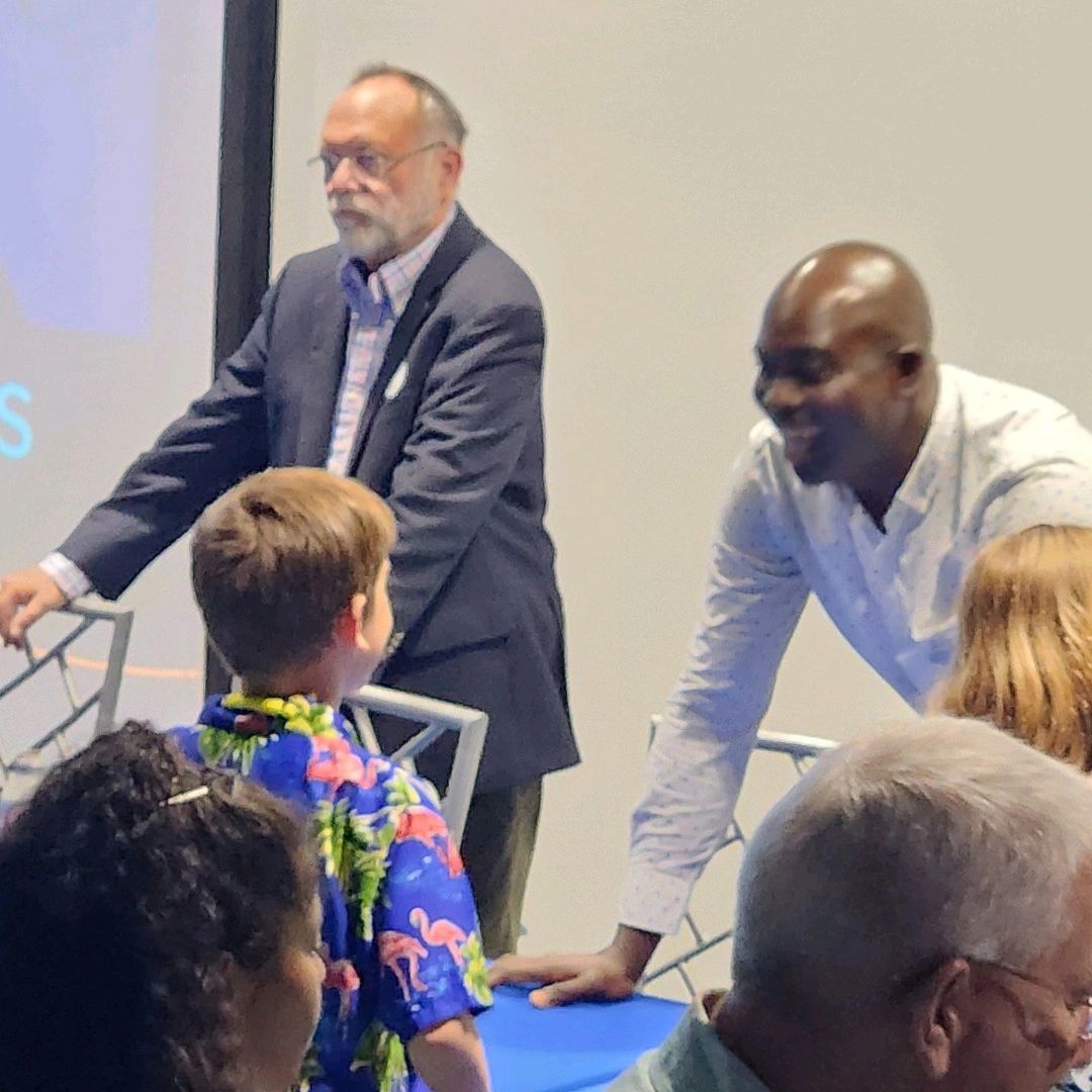 Jacob talking with Dr. Buddy Powell and Jamal Galves after the program.