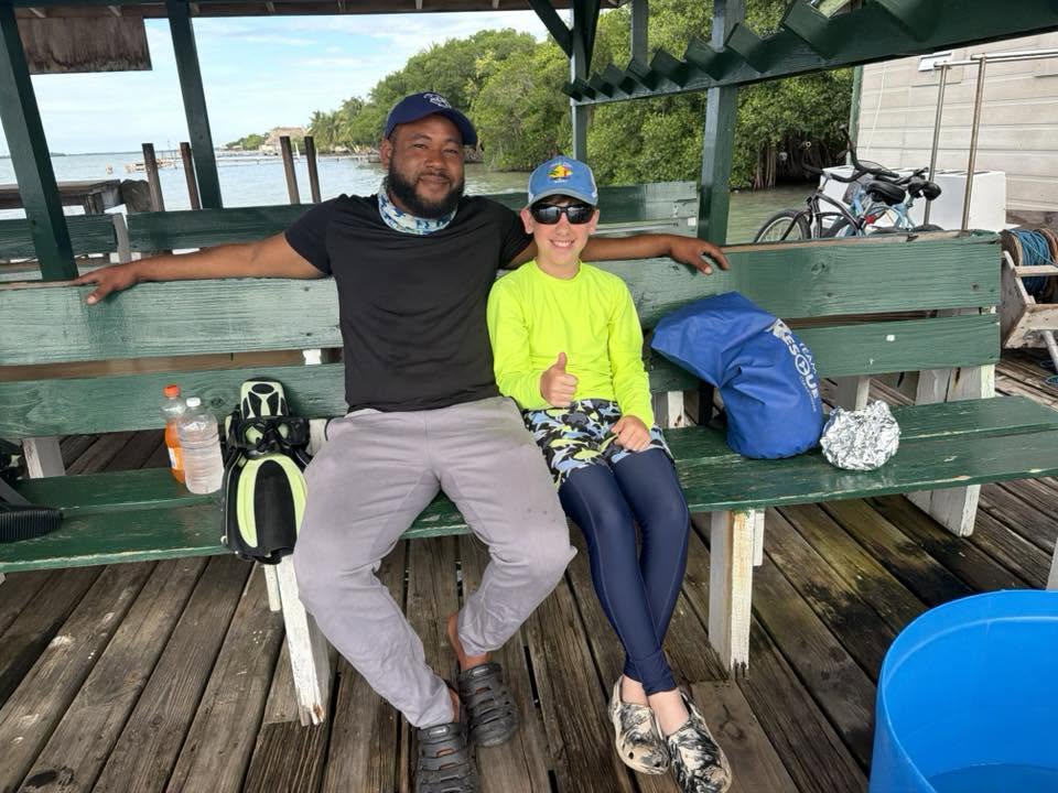 With Glenford Guy before a two-tank dive in Belize.